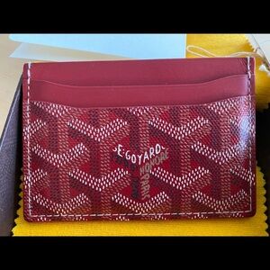 Goyard burgundy cardholder.       Rare